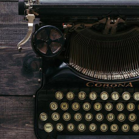 An overhead view of an antique typewriter to represent UCR's 44th-Annual Writers Week Goes Virtual.