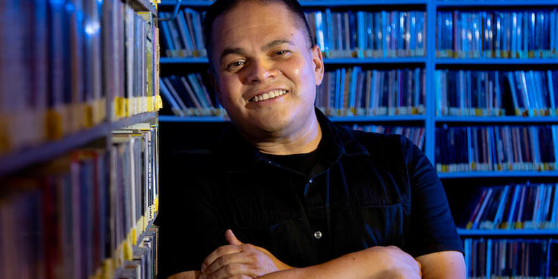 Portrait of Richard T. Rodríguez, professor of English and media and cultural studies, who is also a DJ at KUCR radio, on Thursday, September 1, 2022, in Riverside.