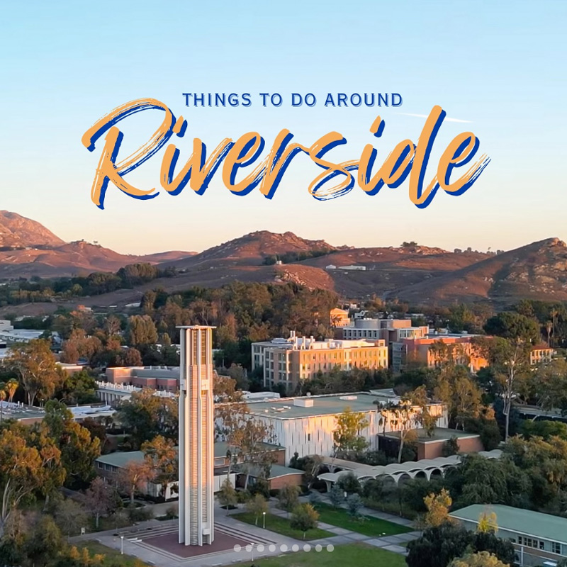 An aerial view of the UCR campus at sunset showing the Bell Tower in the bottom center and the words 'Things to do around Riverside appear above in the sky'.